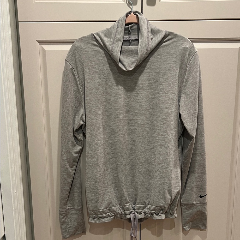 Nike Woman’s Light Gray Turtleneck Sweater. Light and comfortable.